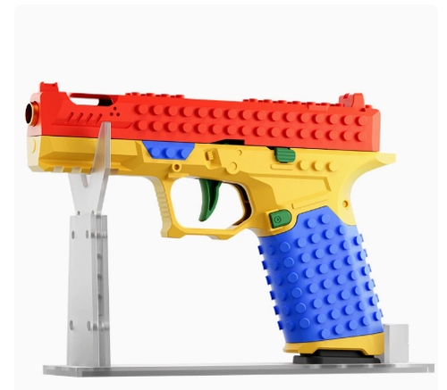 Glock-style DIY building block toy pistol SIG17 modelfeatures rapid-fire action and shell ejectiona STEM-style model kit for boys that fires soft foam darts.