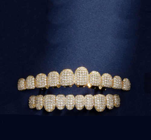 Hip-hop 10-tooth grillz: 18K gold-plated copper set with cubic zirconia—ideal for rap parties.