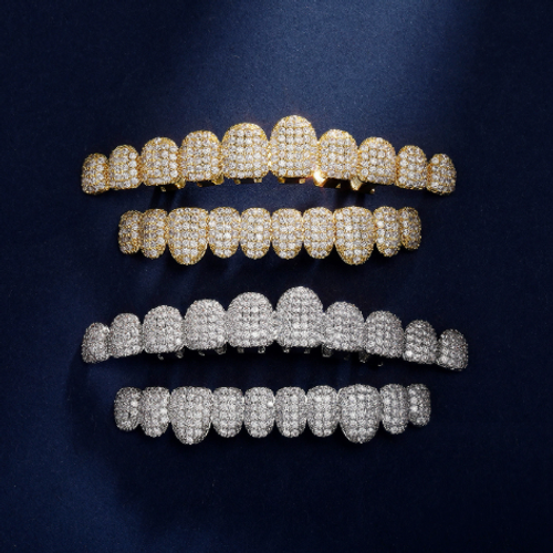 Hip-hop 10-tooth grillz: 18K gold-plated copper set with cubic zirconia—ideal for rap parties.