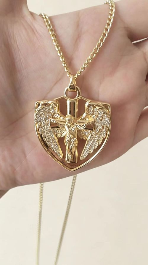 Diamond-accented angel wing and Jesus cross shield pendant