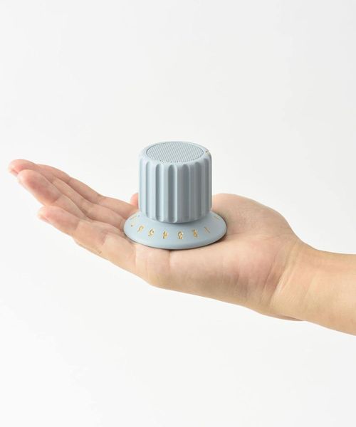 Volume knob speaker, wireless, Bluetooth, IPX4 waterproof, volume control with magnet, suitable for bathroom use.