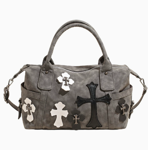 Black-and-white color-block travel tote featuring a cross design a spacious, minimalist large bag suitable for commuting, designed for shoulder or crossbody carry.