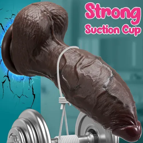 A large, thick, black, curved dildo with a long BBC dual-density design. It features a powerful suction cup to stimulate the G-spot and facilitate extensive sexual activity. Suitable for experienced men and women.