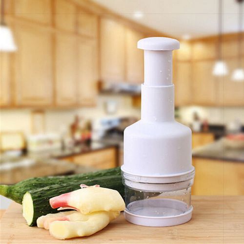 White hand-operated vegetable chopper