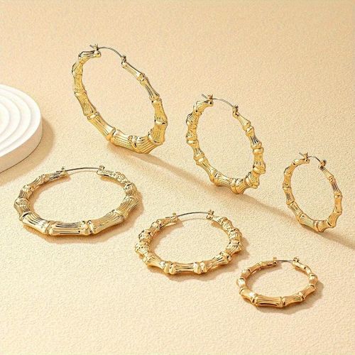 Stylish bamboo-shaped hoop earring set, 6 pairs in one set.  Features large circular earrings, unique and fashionable design, high-quality vintage style, and ultra-lightweight construction.  Suitable for both men and women, perfect for parties and everyday wear, and an excellent gift choice.