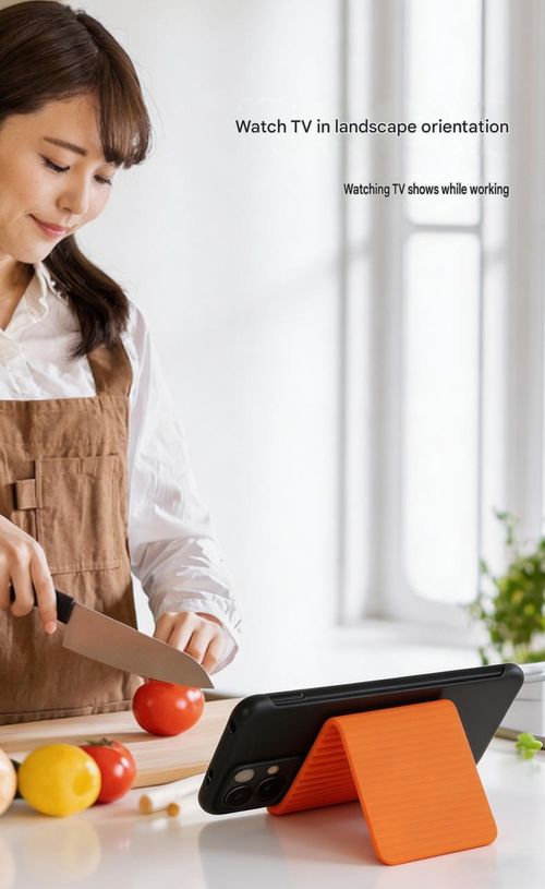 The newly designed deformable folding stand for 2026 features an inner layer of aluminum and silicone, providing flexible support and allowing for bending at will. It's compatible with a wide range of phones. Orange.