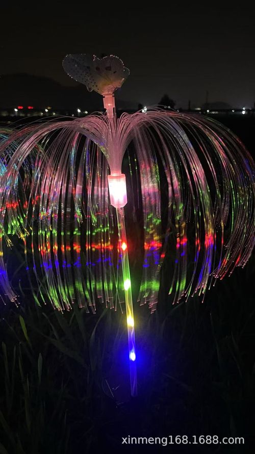 Solarpowered automatic charging garden light with stainless steel ground stake features automatic colorchanging capabilities and zero electricity consumptionideal for courtyards and lawns.
