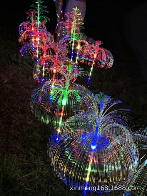 Solarpowered automatic charging garden light with stainless steel ground stake features automatic colorchanging capabilities and zero electricity consumptionideal for courtyards and lawns.