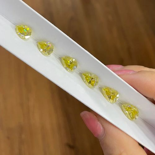 Hot Sale Alibaba Moissanite Diamond Pear Shape 5x8/7x10/7x11MM Plated Vivid Yellow Color Moissanite