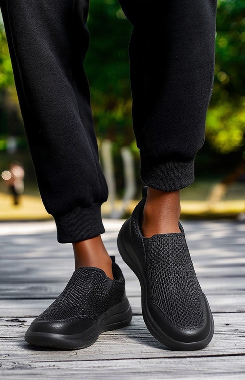 A pair of new style sports shoes for men, ideal for lazy days, lightweight shoes.