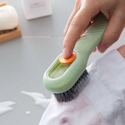 Multi-functional liquid-dispensing shoe brush, a household tool for pressing to dispense liquid and clean shoes