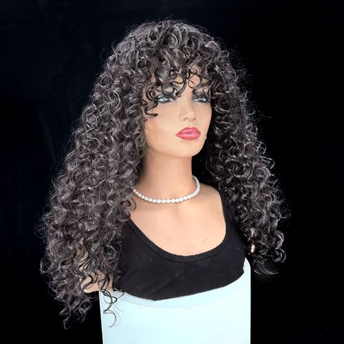 Glue-free, natural-style long curly wig in dark brown-black — includes wig cap and care solution.