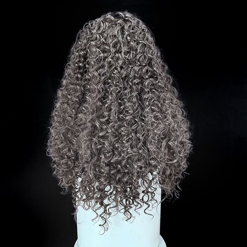 Glue-free, natural-style long curly wig in dark brown-black — includes wig cap and care solution.