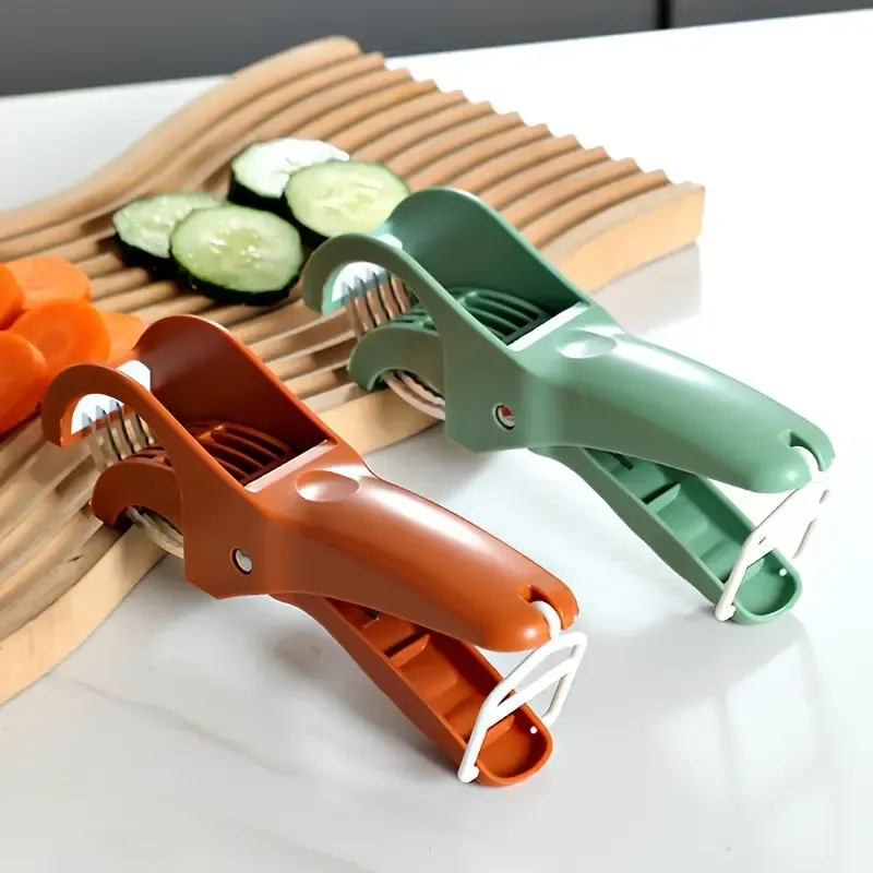 Manual multi-functional fruit and vegetable slicer with stainless steel blades - ergonomic handle for evenly slicing, dicing and shredding cucumbers, carrots, sweet peppers, tomatoes, apples, potatoes - a compact kitchen tool for salad preparation and fruit slicing
