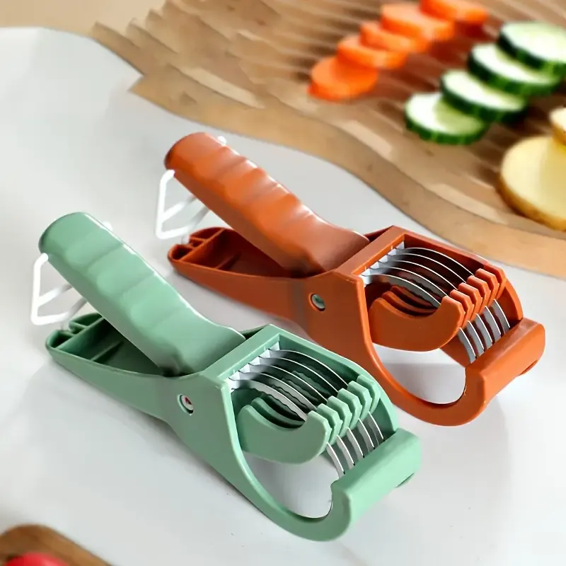 Manual multi-functional fruit and vegetable slicer with stainless steel blades - ergonomic handle for evenly slicing, dicing and shredding cucumbers, carrots, sweet peppers, tomatoes, apples, potatoes - a compact kitchen tool for salad preparation and fruit slicing