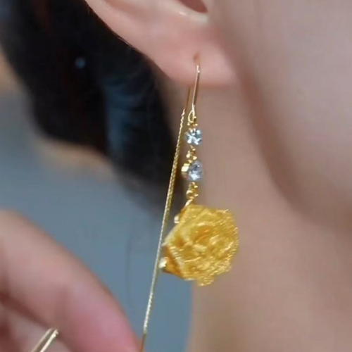 Long ear wire earrings made of copper alloy, featuring a niche, retro and three-dimensional yellow rose design. They are stylish with a French charm and extremely versatile.