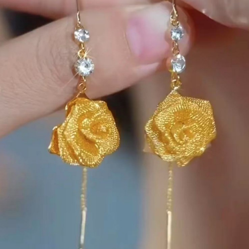 Long ear wire earrings made of copper alloy, featuring a niche, retro and three-dimensional yellow rose design. They are stylish with a French charm and extremely versatile.