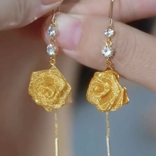 Long ear wire earrings made of copper alloy, featuring a niche, retro and three-dimensional yellow rose design. They are stylish with a French charm and extremely versatile.