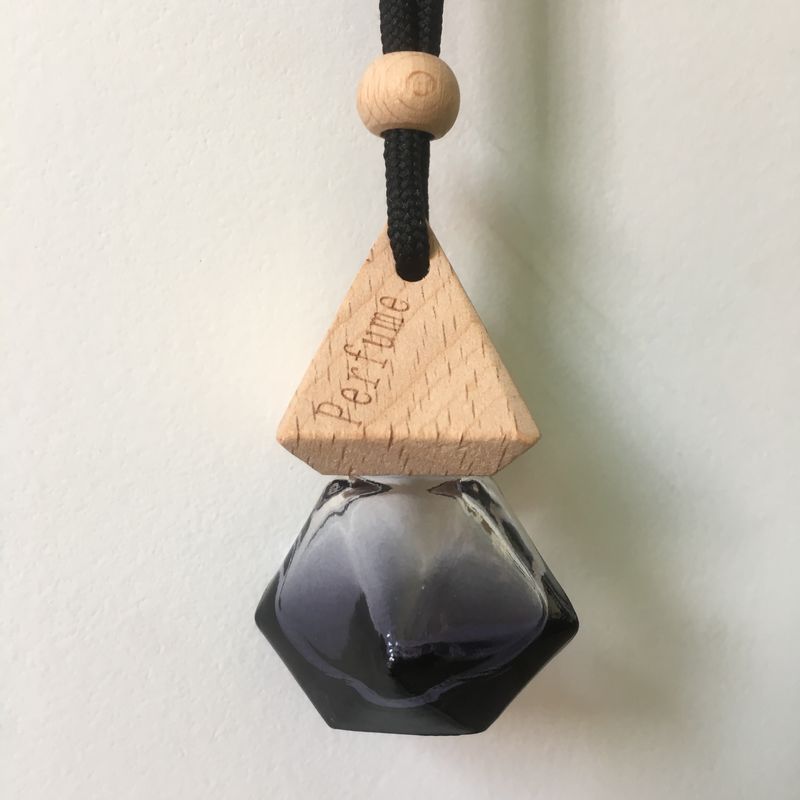 Car perfume aromatherapy pendant, car hanging ornament, long-lasting light fragrance essential oil, in-car pendant, hanging glass bottle with wooden cap