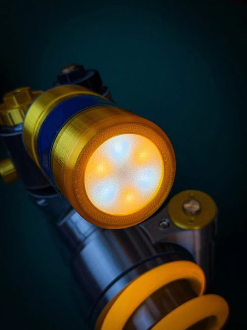 🔥Inspired Suspension Shock Absorber Lamp - Adjustable LED Light for Gamers & Car Enthusiasts