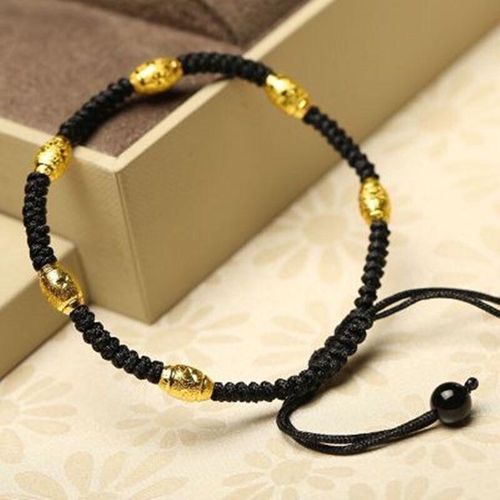 Hand-woven red cord bracelet, strung with sand-gold fortune-turning beads. It's a finished product, no need for you to do it yourself.