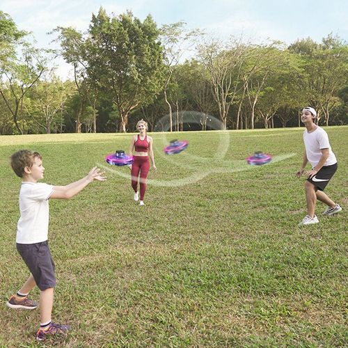 Fingertip gyroscope glowing spinning aircraft