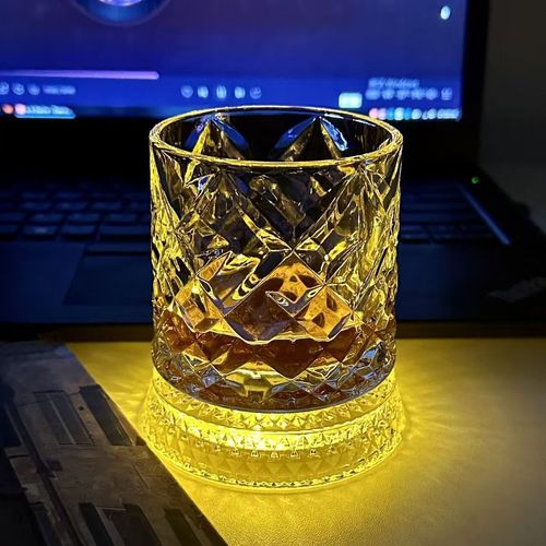 Ghana Exclusive: Rotating Whiskey Glass + Luminous Coaster – Unlock a new level of drinking ritual.
