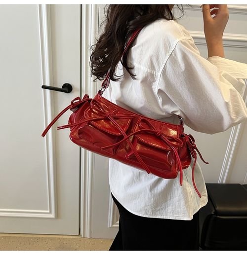 Tassel bow motorcycle bag for women,new style for spring,summer 2025,multi-pocket,pleated,large capacity,single shoulder and underarm bag.