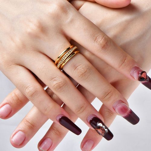 Fashionable niche temperament creative personality hand jewelry stainless steel plated 18K gold three-layer middle diamond ring female