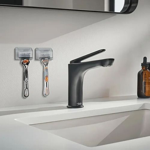 Wall-mounted razor holder
