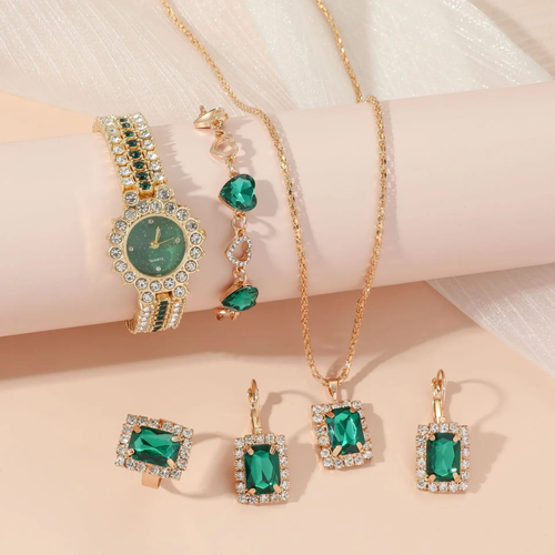 This 5-piece jewelry set will make you feel like a real diva 🎀💍. It's perfect for any woman who wants to feel elegant and refined - a luxurious set with a pair of earrings, bracelet, ring, watch and necklace! ✨
