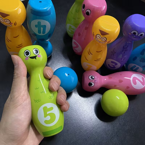 10-Bottle Bowling Toy Set with 2 Balls - Vibrant Cartoon Fun Expressions, Exquisite Pad Printing, Durable Non-Fading Design, and Gift Box Packaging - Perfect for Halloween and Christmas Gifts