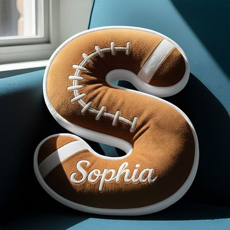 Personalized lettered football-themed throw pillows that football fans can't get enough of