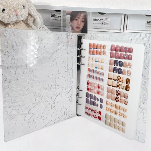 Transparent water ripple cover loose leaf nail storage album. Reusable metal ring binder easy to add or remove inner pages. Keep nail tips tidy and well displayed. Suitable for nail salon technicians and personal nail art lovers.