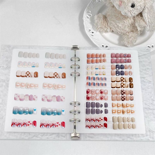Transparent water ripple cover loose leaf nail storage album. Reusable metal ring binder easy to add or remove inner pages. Keep nail tips tidy and well displayed. Suitable for nail salon technicians and personal nail art lovers.