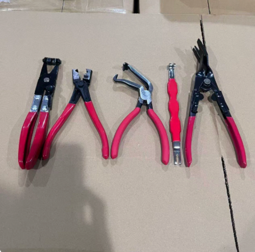 Automotive repair tool kit, including hose wrenches, hose clamp wrenches, and multi-functional power disconnect pliers.