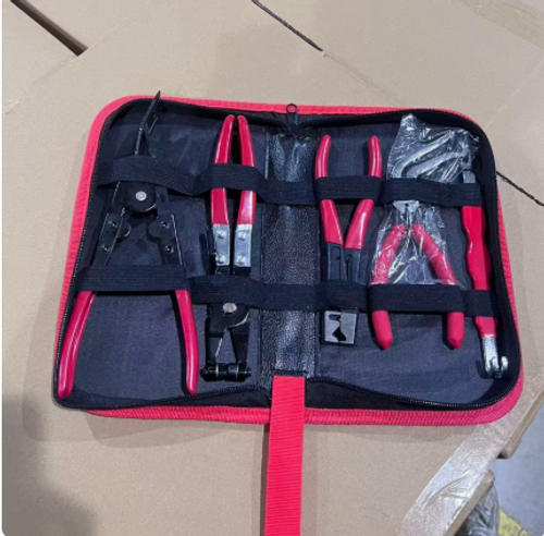 Automotive repair tool kit, including hose wrenches, hose clamp wrenches, and multi-functional power disconnect pliers.