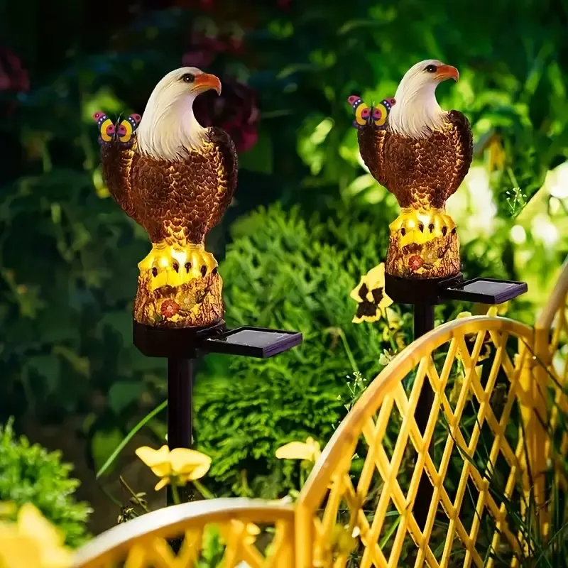 Solar-powered eagle ground plug lights