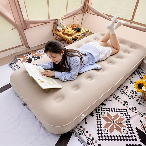 Portable inflatable sleeping mat