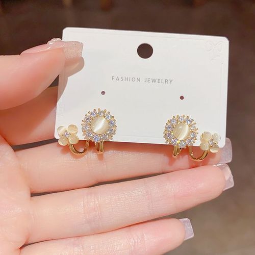 50% OFF Light Luxury Fashion High-end Simple Cat's Eye Stone Flower Alloy Earrings