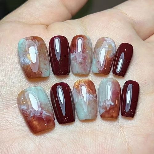 The new handcrafted, custom-made press-on nails are reusable, offering a high-end, luxurious feel.