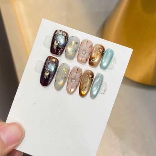 The new handcrafted, custom-made press-on nails are reusable, offering a high-end, luxurious feel.