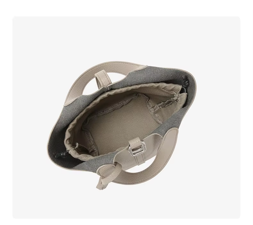 This stylish women's leather handbag blends elegance and practicality. Spacious inside, fits daily essentials. Perfect for work or dates—adds charm to any outfit.