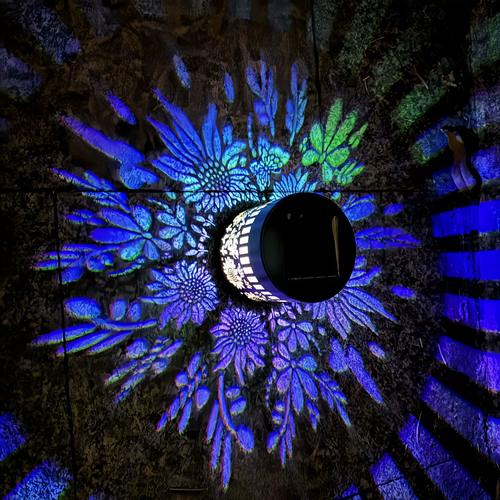 Creative Hollow Cylinder Solar LED Iron Art Outdoor Waterproof Wall Lamp for Garden,Supports switching between seven pattern colors.