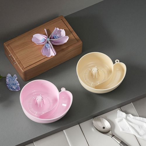 Two snail-designed draining baskets