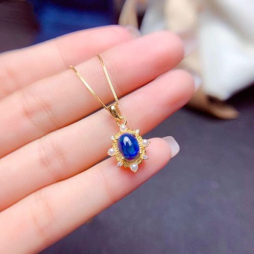 Silver Inlaid Blue Opal Ring Pendant Set