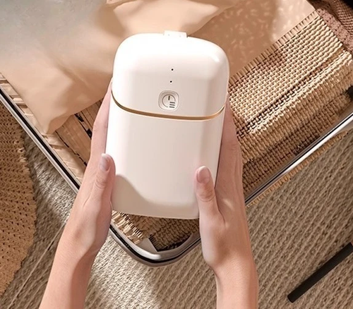 Compact portable electric clothes dryer saves space and comes with an automatic drying bag design.
