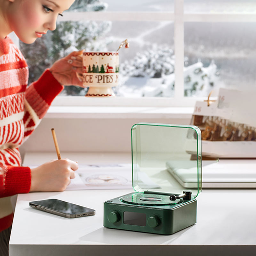 This new portable retro Bluetooth speaker features adjustable lights, a digital clock, and four natural sound effects