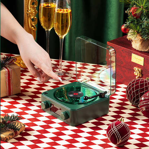 This new portable retro Bluetooth speaker features adjustable lights, a digital clock, and four natural sound effects