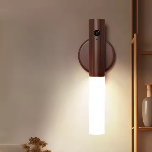 A sensor night light that can be handheld or wall-mounted
